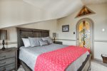 Bedroom 3 features a queen-size bed 